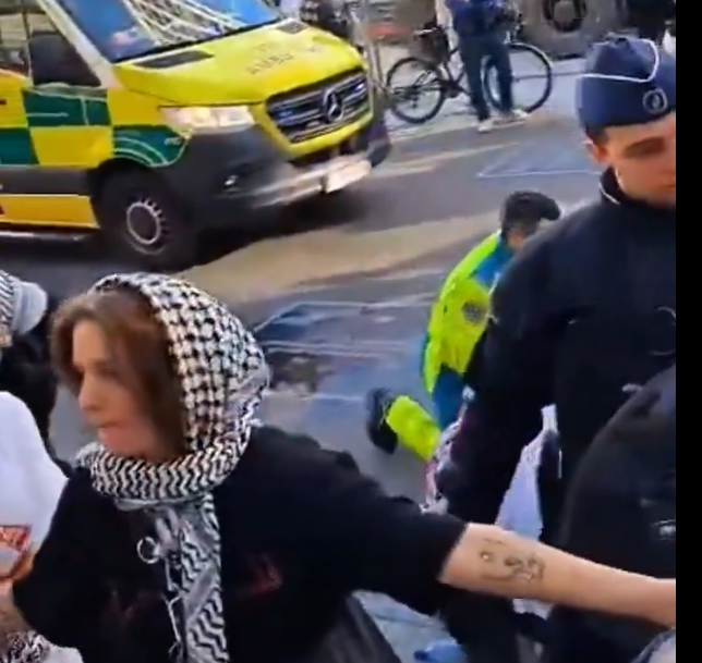 “Emergency responders and Belgian police secure the scene after a stabbing at a pro-Gaza protest in Brussels.”