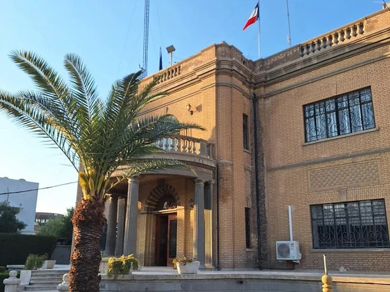 The French flag flies over France's embassy in Bagdad, located in the Lawee family mansion. Photo by Government of France