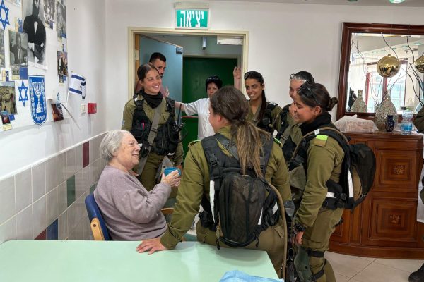 Home Front Command rescue brigade fighters returning civilians to the nursing home in the Jerusalem hills (IDF spokesperson)