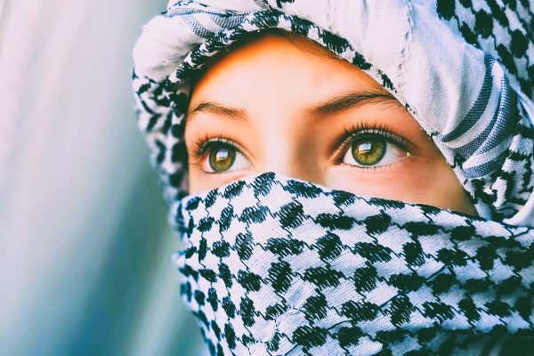 Illustrative: A Palestinian girl wearing a white Palestinian keffiyeh (public domain)