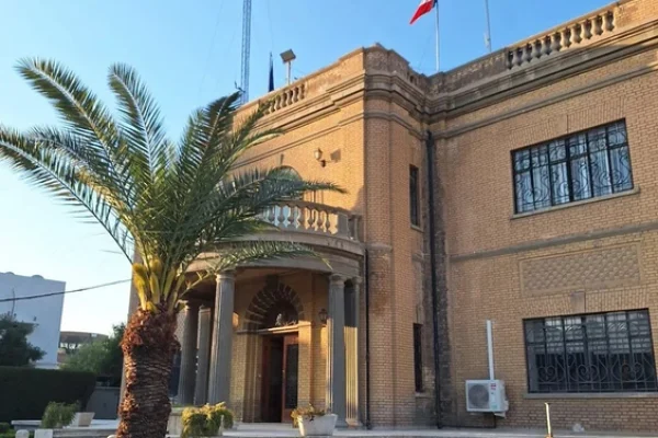 The French flag flies over France's embassy in Bagdad, located in the Lawee family mansion. Photo by Government of France
