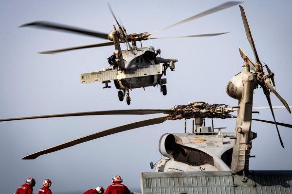 MH-60S Sea Hawk helicopters take off from the flight deck of the Nimitz-class aircraft carrier USS Nimitz (CVN 68) during flight operations in the U.S. Central Command area of responsibility. (CENTCOM)