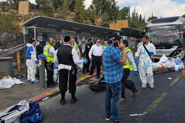 ZAKA teams at the Ramot Junction in Jerusalem, recovering victims of today’s deadly terror attack. (Photo: ZAKA Spokesman)
